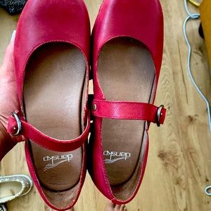 Red shoes by Dansko. Worn once. 2 inch heel. Great for Fall season